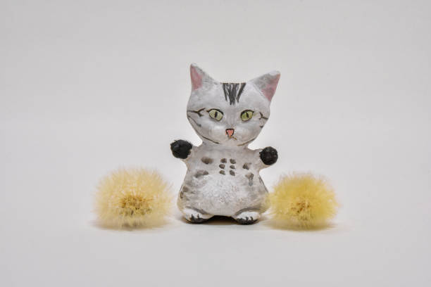 istock Homemade cat doll and dandelion 1216327150