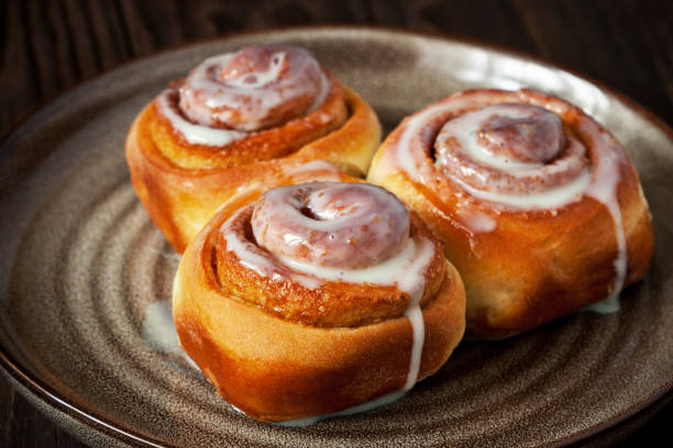 istock Homemade cinnabons  rolls with cream  glaze 1216329641
