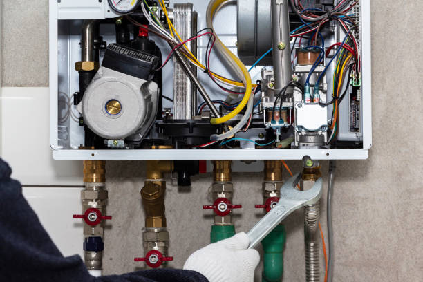 istock gas boiler repair service, preparation for heating. 1216329991
