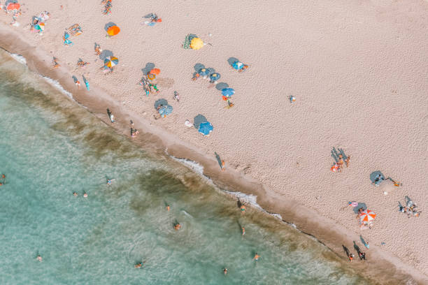 istock beach crowd from aerial look 1216330803