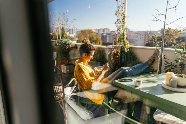 enjoying spring on the balcony - cell human cell plant cell virus imagens e fotografias de stock