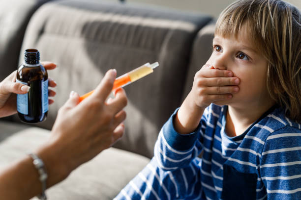 istock I don't want cough syrup mommy! 1216333274
