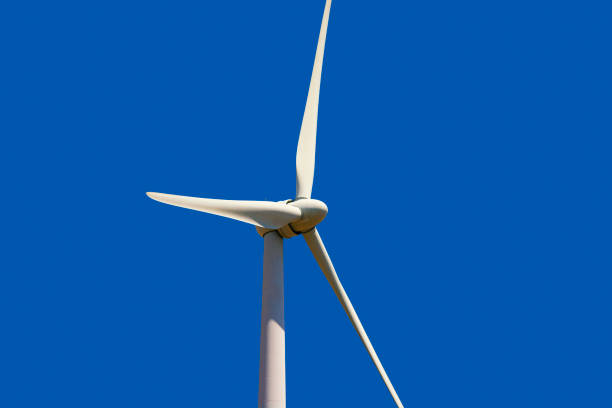 Windmill on a clear blue background stock photo