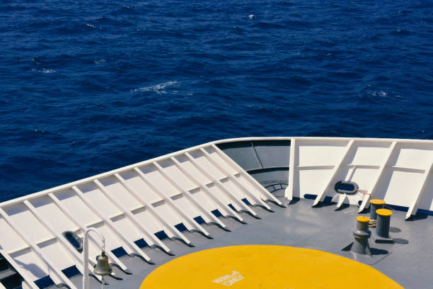 Cargo ship front deck view while traveling at sea. stock photo