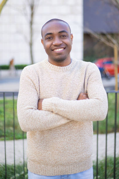 istock Front view of cheerful guy standing and looking at camera 1216337321