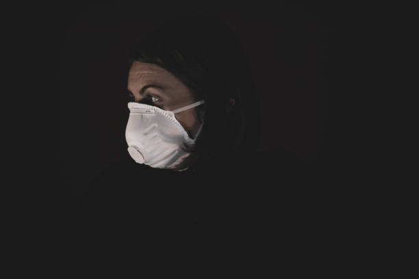 istock Girl with mask to protect her from Coronavirus 1216338546