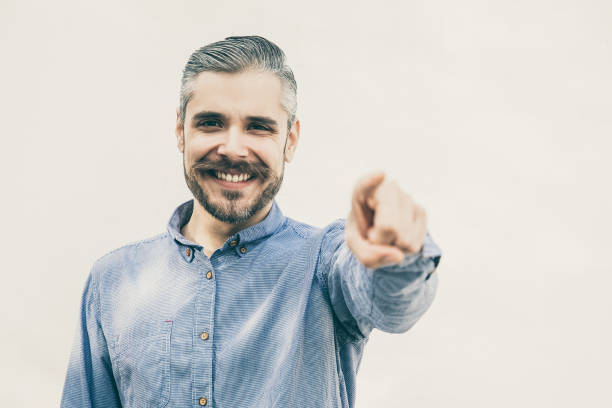 istock Positive joyful man laughing at you 1216340711