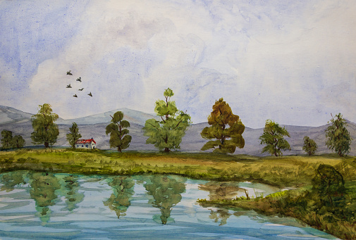 Watercolor handmade painting landscape with hills, small building and pond reflection trees