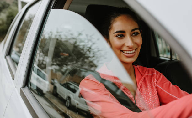 istock Woman driving her car 1216345318
