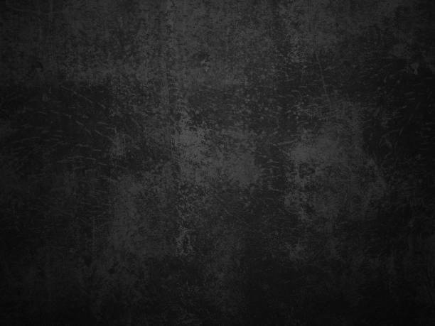 istock Dark concrete texture wall background. Black grunge cement wall texture for interior design. Copy space for add text. 1216348070