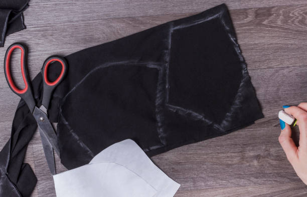 istock details drawn in chalk on black fabric for sewing protective masks at home 1216348923