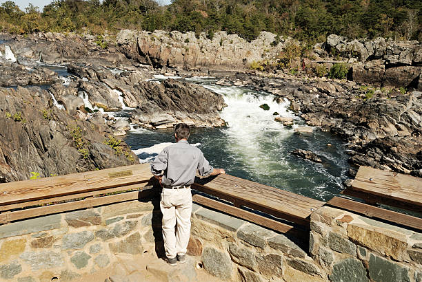 istock Senior enjoys view at Great Falls Natl Park overlook 121635191