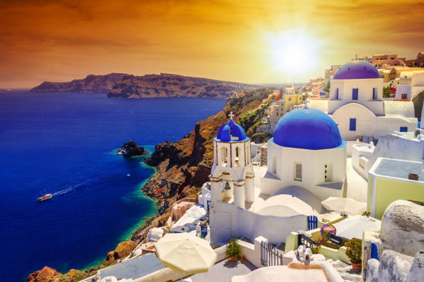 istock Beautiful sunset over Oia town on Santorini island 1216352204