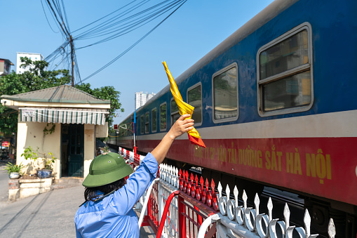 Ho Chi Minh City, Viet Nam - August 7, 2016: Group of Vietnamese passenger sit in wagon train, people with public transport service for long journey by, train moving on rail, Vietnam