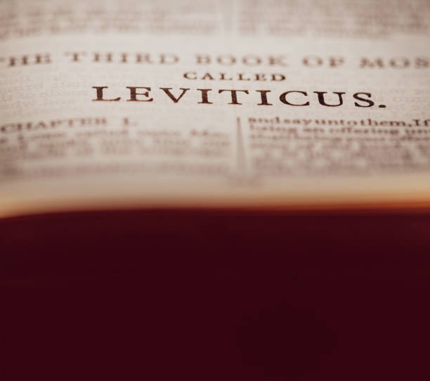 istock Close up macro image of a page from the bible showing  ‘Leviticus’  with easily extendable background for text to sit on 1216354932