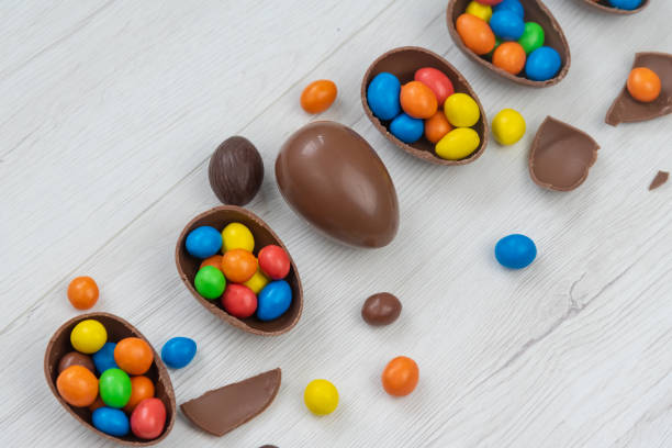 istock Chocolate Easter eggs and chocolate eggs filled with sweet and colorful candies 1216355173