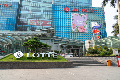 Hanoi, Vietnam - Mar 21, 2019: Facade view of Lotte Center Hanoi at Dao Tan - Lieu Giai street, with logo sign and advertisement banners
