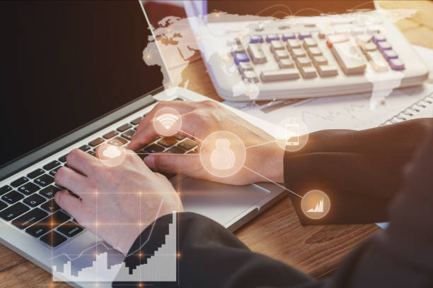 istock Business man presenting on open laptop at work office 1216357444