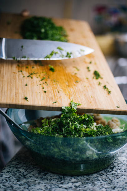 istock Woman making quinoa salad 1216359420