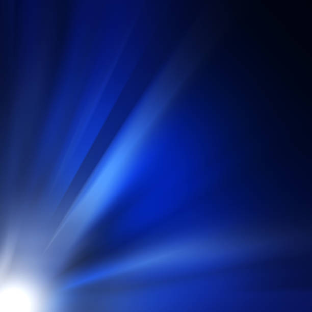 istock Abstract Sun on blue sky with lenses flare 1216359517