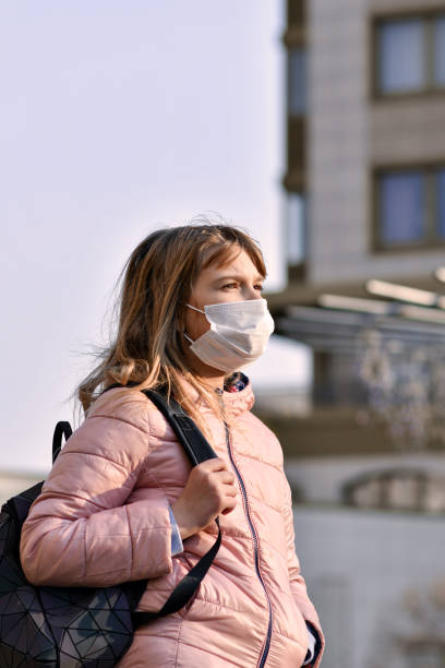istock City kids in the masks 1216360446