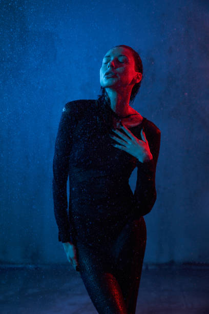 istock Sexy wet woman posing in studio. 1216360612