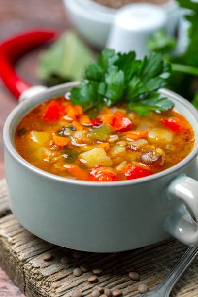 istock Homemade lentil soup with vegetables close-up. 1216361137