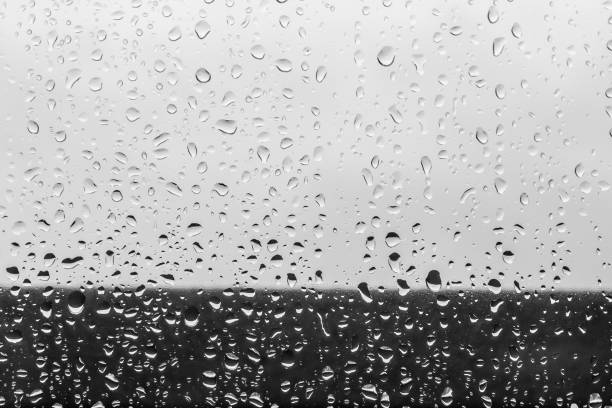 istock Small raindrops on glass in inclement weather 1216361861