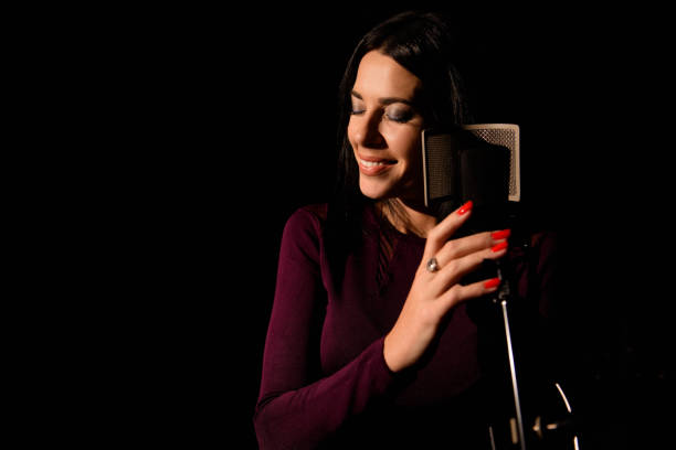 istock Professional musician recording new song in studio. 1216362392