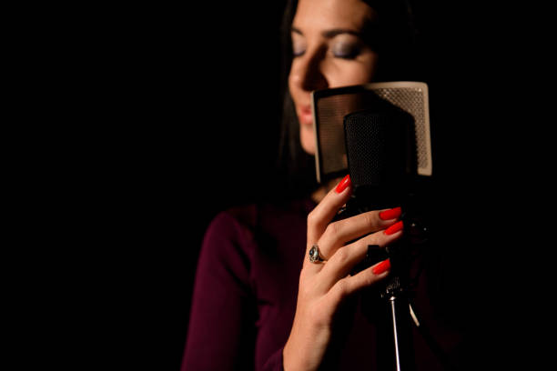 istock Professional musician recording new song in studio. 1216362401