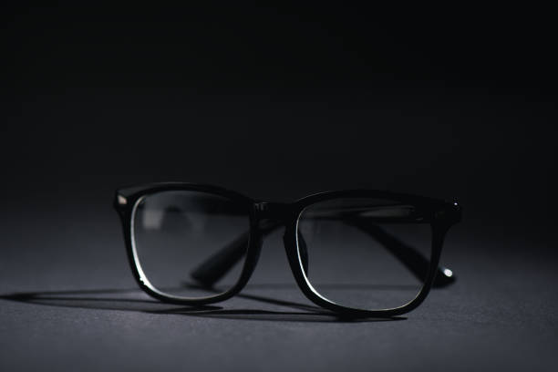 istock close up of glasses on black with copy space 1216365424