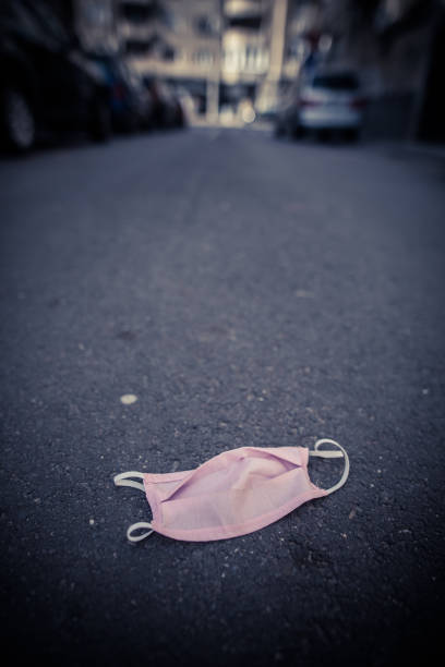 istock Abandoned pink face protection mask 1216366144