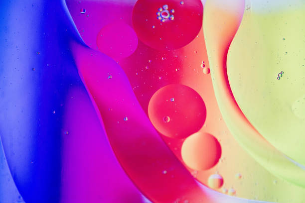 istock Rainbow abstract defocused background picture made with oil, water and soap 1216366593