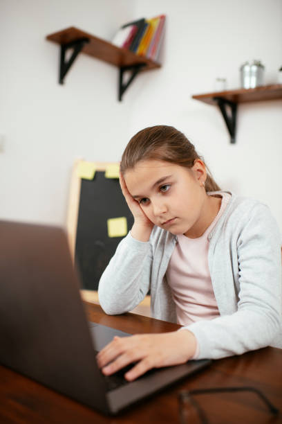istock Girl using laptop stock photo 1216366602