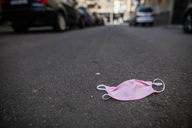 Abandoned pink face protection mask