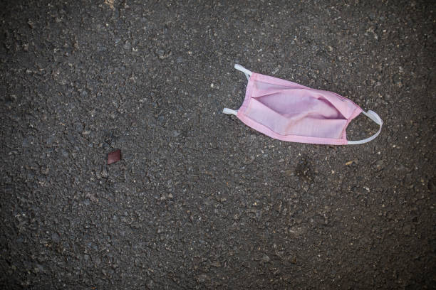 istock Abandoned pink face protection mask 1216367702