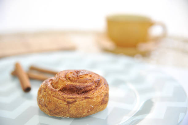 istock Cinnamon bun. Coffee desserts. Delicious dessert with coffee. 1216374432