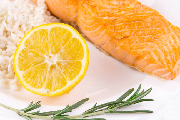 istock Fried salmon fillet with rice. 1216374937