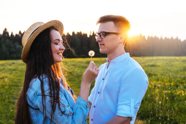 istock Loving couple in the field. Sunset. 1216376667