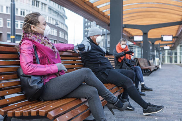 istock Commuters social distancing at a station 1216378353