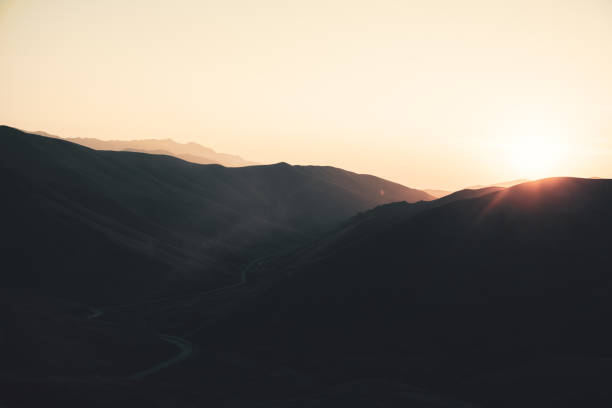 istock mountain with colorful sunset background 1216379084