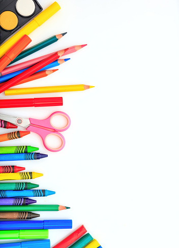 Back to school. School supplies on white background, top view. Kid creative and education concept.