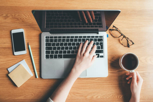 istock Young woman working in a home office. 1216381338