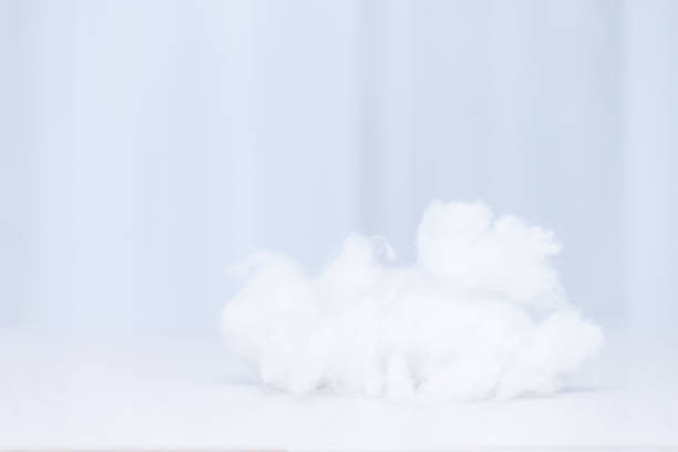 Polyester stable fiber on yellow background.