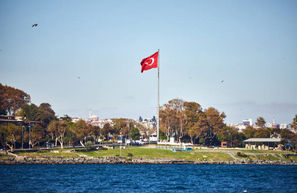 istock Turkey flag and Istanbul view from ferry - travel background 1216383073