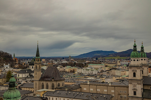 aerial view drone footage of the famous Zurich along the Limmat river international  landmarks such as the Grossmunster cathedral and the lake bridge in Switzerland largest city.