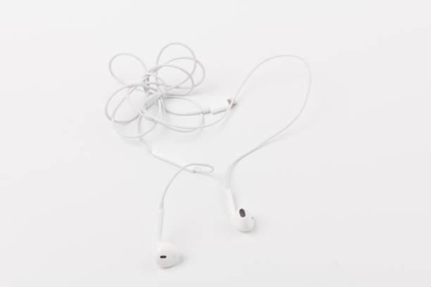 istock White headphones with headset on white isolated background 1216384145