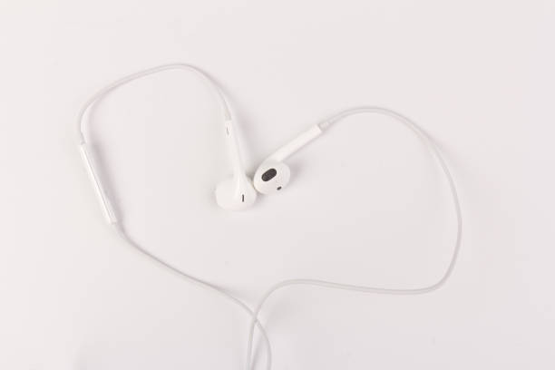 istock White headphones with headset on white isolated background 1216384146