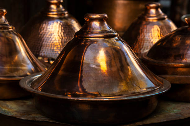Traditional moroccan copper brass tagine (tajine). stock photo