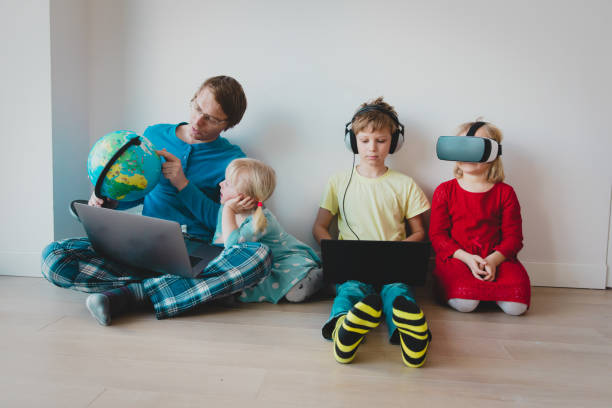 istock family on distant learning at home, online education for kids 1216387863